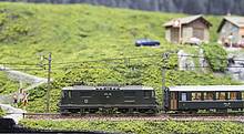 „Graubündenbahn“ im Maßstab H0m präsentiert. Im Mittelpunkt dieser Modellbahnanlage stand der Bahnhof Schiers, einer der vielen malerischen Bahnhöfe der beliebten Rhätischen Bahn.