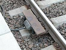 Typische Indusi im Gleisbett der DB