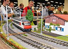 Die Modellbahn-Anlagen sind auf der IMA in Köln immer dicht umlagert, wie dieses Bild der IMA von 2012 zeigt